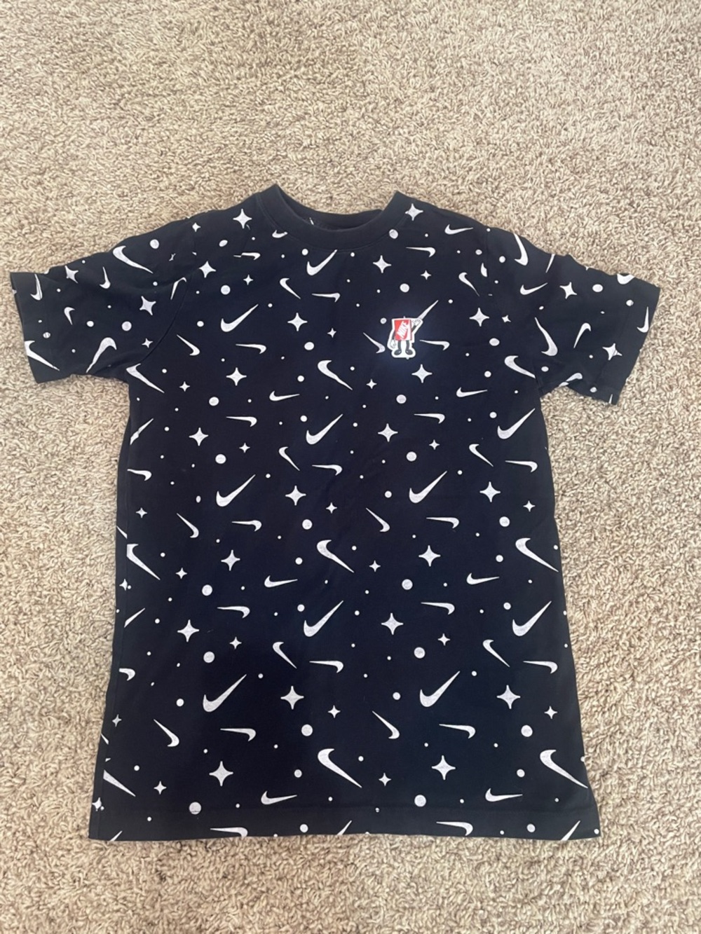 Nike Black Tee with White Allover Swoosh and Star Print